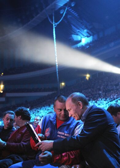 Vladimir Putin attends M-1 Global mixed martial arts competition