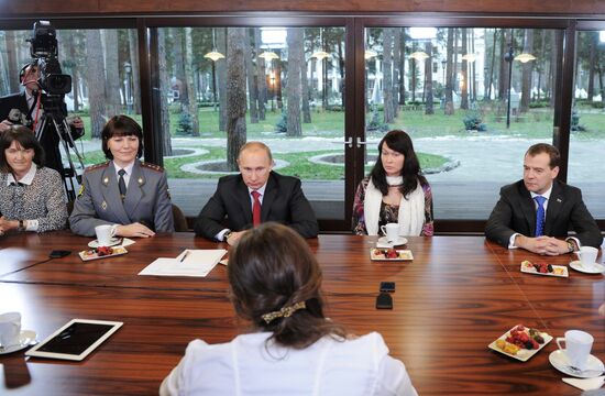 D.Medvedev and V.Putin meet with Women's Forum