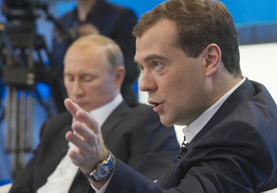 Dmitry Medvedev and Vladimir Putin meet with voters in Moscow