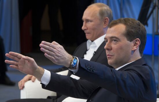 Dmitry Medvedev and Vladimir Putin meet with voters in Moscow