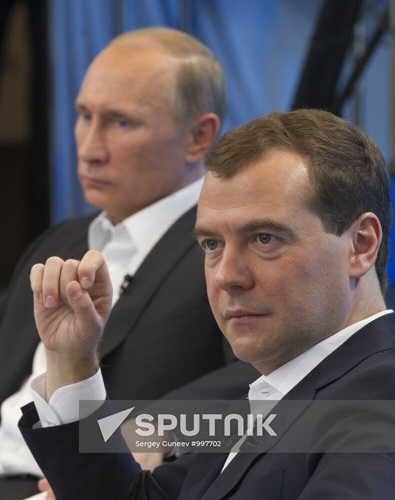 Dmitry Medvedev and Vladimir Putin meet with voters in Moscow