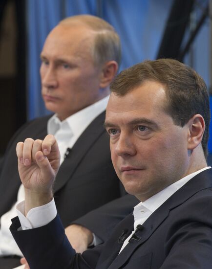 Dmitry Medvedev and Vladimir Putin meet with voters in Moscow