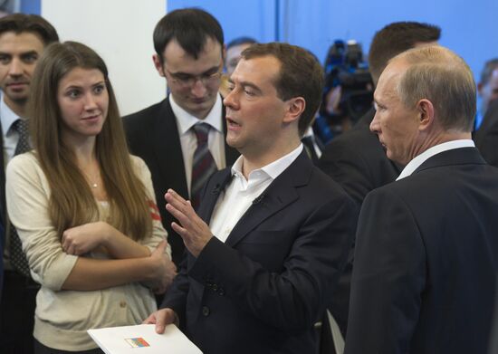 Dmitry Medvedev and Vladimir Putin meet with voters in Moscow