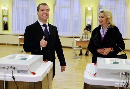 Dmitry Medvedev and his wife vote at State Duma elections