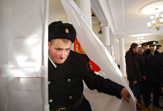 People vote in Russian State Duma elections in Ukraine