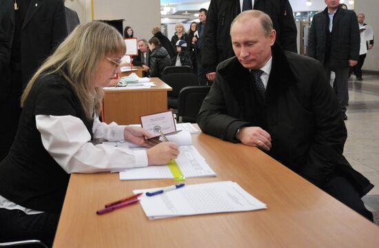Vladimir Putin takes part in State Duma elections