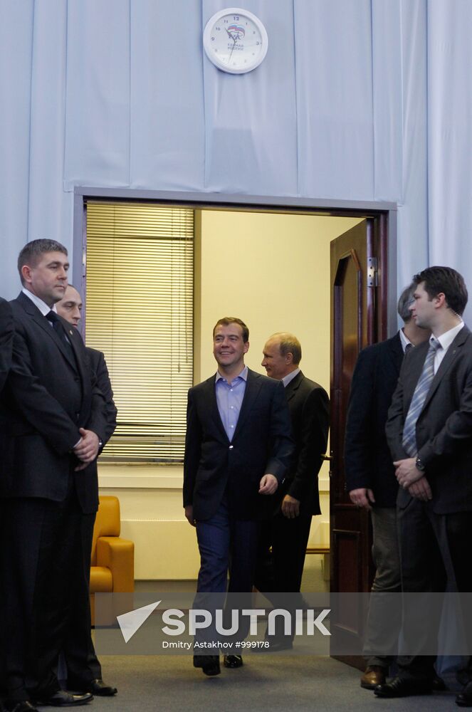 Dmitry Medvedev and Vladimir Putin at United Russia office