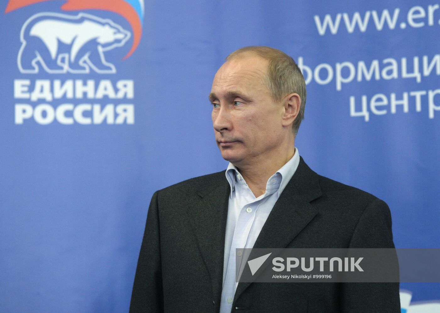 Dmitry Medvedev and Vladimir Putin at United Russia office