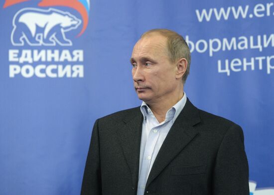 Dmitry Medvedev and Vladimir Putin at United Russia office