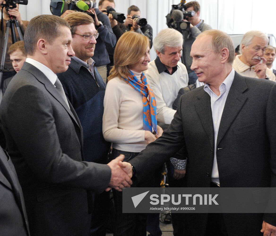 D. Medvedev and V. Putin at United Russia party headquarters