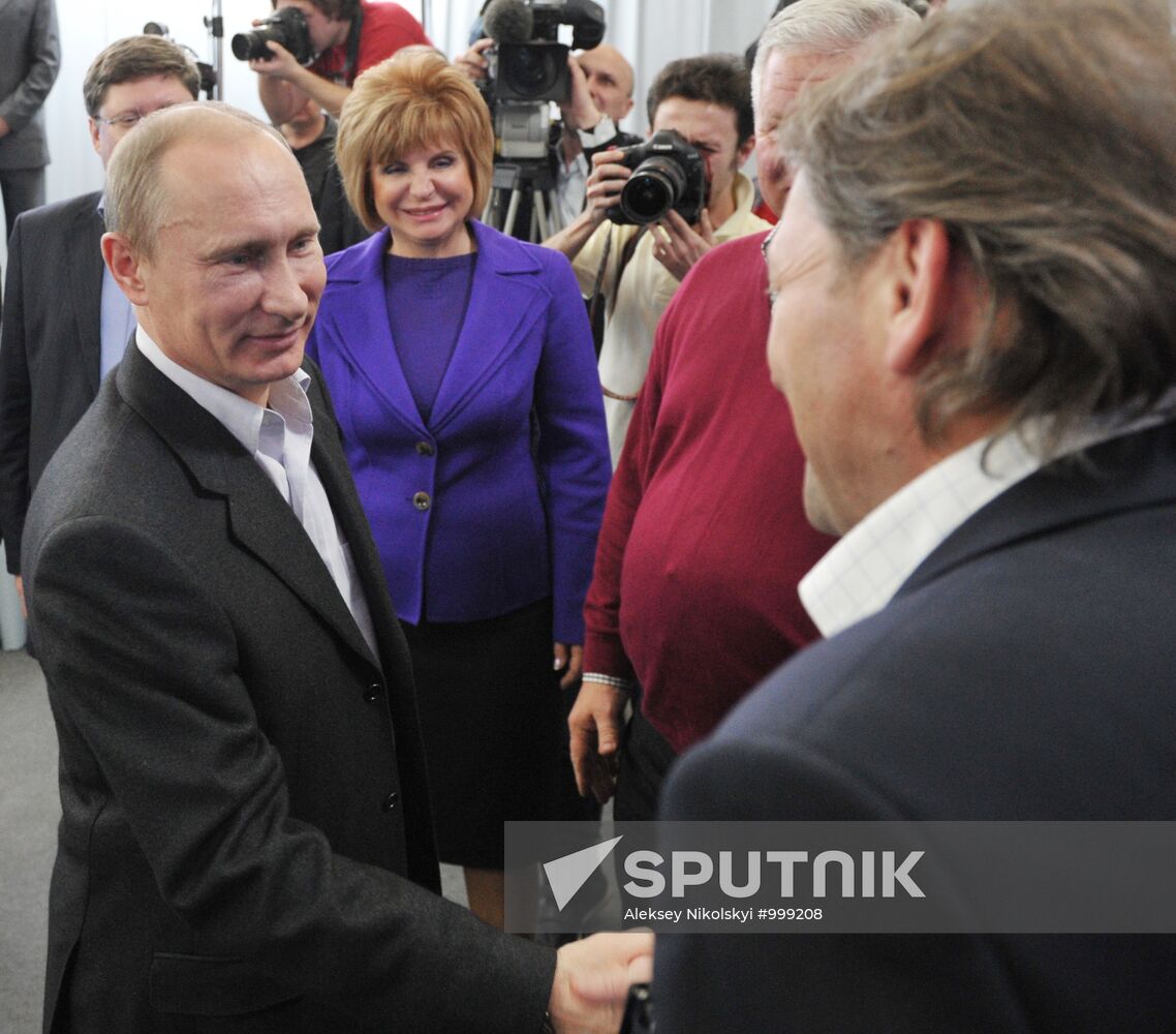 D. Medvedev and V. Putin at United Russia party headquarters