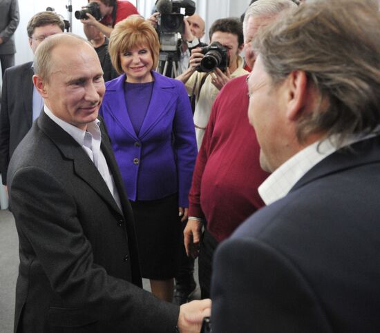 D. Medvedev and V. Putin at United Russia party headquarters