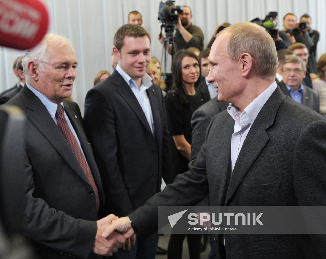 D. Medvedev and V. Putin at main United Russia headquarters