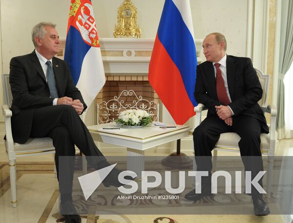 Russian President Vladimir Putin meets his Serbian counterpart