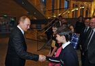 January 7, 2014. Russian President Vladimir Putin, left, talks with members of the Consolidated Russian children's choir during a visit to choir practice in the new building of the Mariinsky Theatre in St. Petersburg Location: Russia, . Author: Mikhail Klimentyev/Sputnik. Vladimir Putin's working visit to St. Petersburg