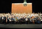 January 7, 2014. Russian President Vladimir Putin, center, is photographed with members of the Combined Children's Choir of Russia during a visit to choir practice in the new building of the Mariinsky Theatre in St. Petersburg. Location: Russia, . Author: Mikhail Klimentyev/Sputnik. Vladimir Putin's working visit to St. Petersburg