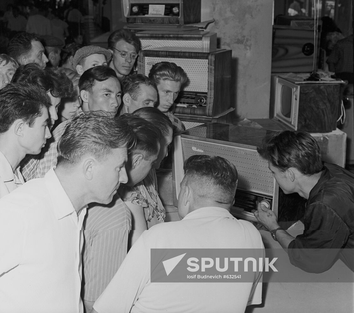 Residents of AlmaAta listen to TASS news Sputnik Mediabank