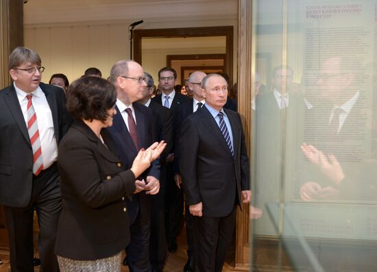 Russian President Vladimir Putin meets with Prince Albert II of Monaco