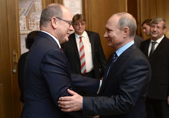 Russian President Vladimir Putin meets with Prince Albert II of Monaco