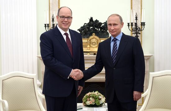 Russian President Vladimir Putin meets with Prince Albert II of Monaco