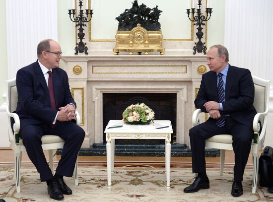 Russian President Vladimir Putin meets with Prince Albert II of Monaco