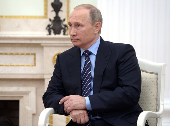 Russian President Vladimir Putin meets with Prince Albert II of Monaco