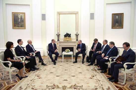 Russian President Vladimir Putin meets with Prince Albert II of Monaco