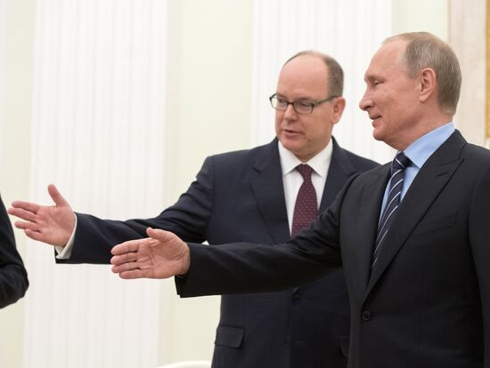 Russian President Vladimir Putin meets with Prince Albert II of Monaco