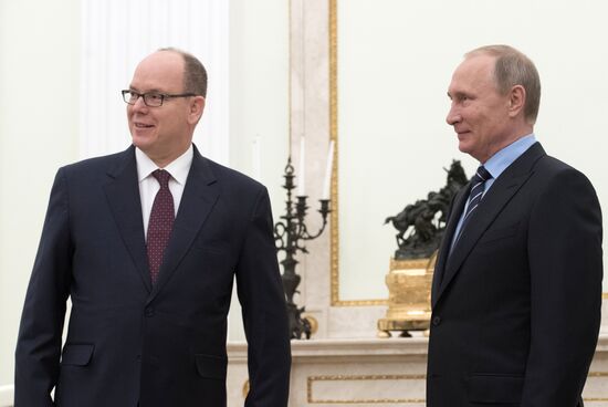 Russian President Vladimir Putin meets with Prince Albert II of Monaco
