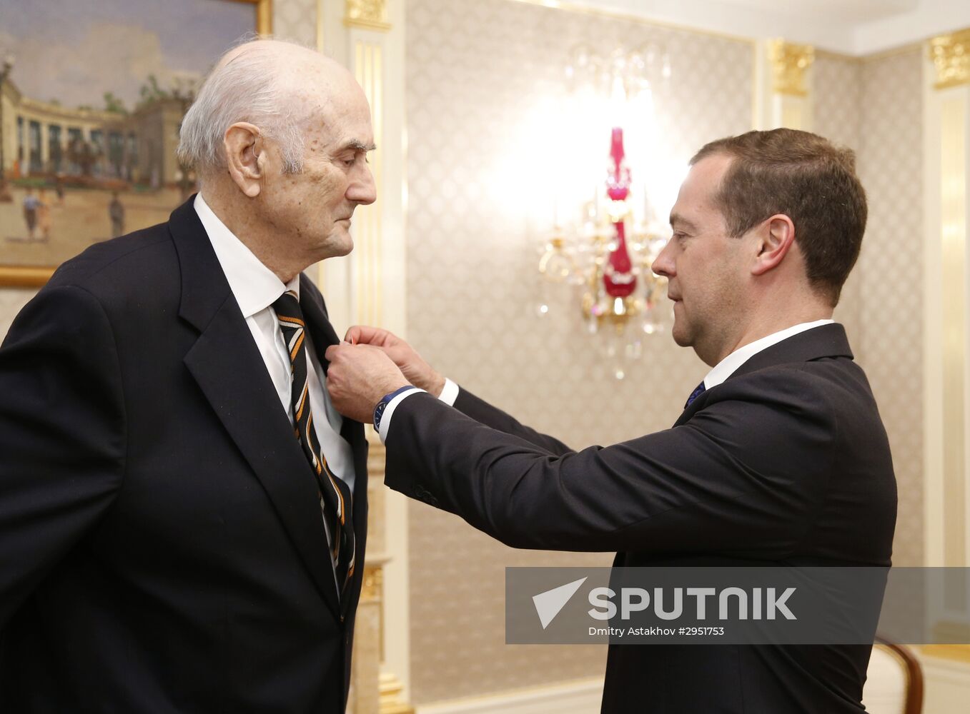 Russian Prime Minister Dmitry Medvedev awards the Order of Alexander Nevsky to Prince Dmitry Romanov