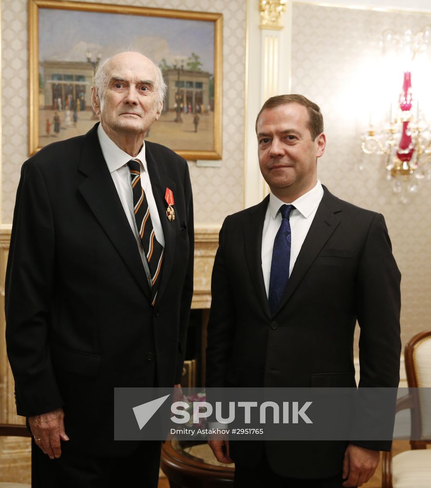 Russian Prime Minister Dmitry Medvedev awards the Order of Alexander Nevsky to Prince Dmitry Romanov