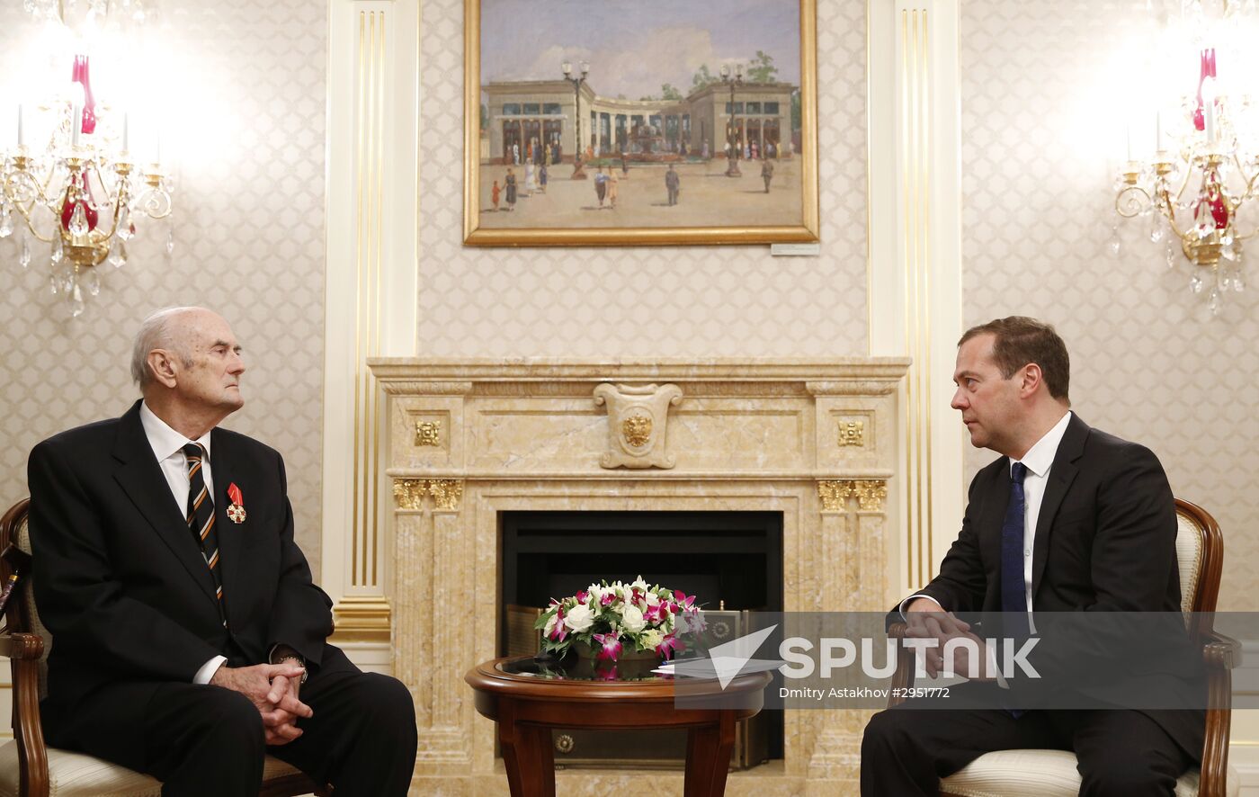 Russian Prime Minister Dmitry Medvedev awards the Order of Alexander Nevsky to Prince Dmitry Romanov