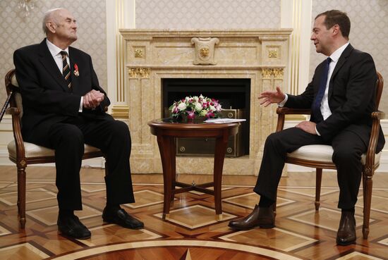 Russian Prime Minister Dmitry Medvedev awards the Order of Alexander Nevsky to Prince Dmitry Romanov