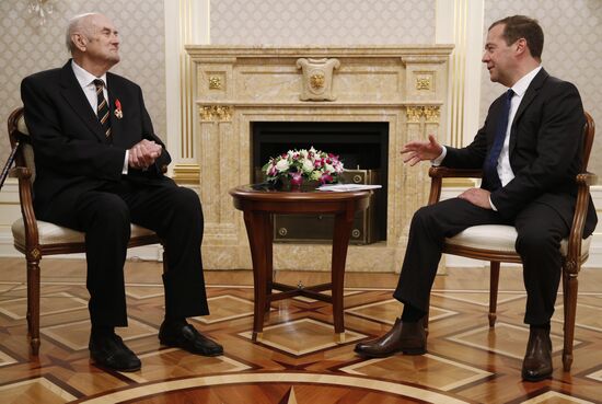 Russian Prime Minister Dmitry Medvedev awards the Order of Alexander Nevsky to Prince Dmitry Romanov