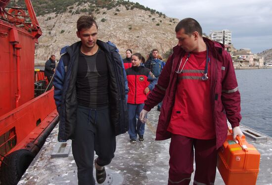 Meeting the sailors of the sunken crane boat