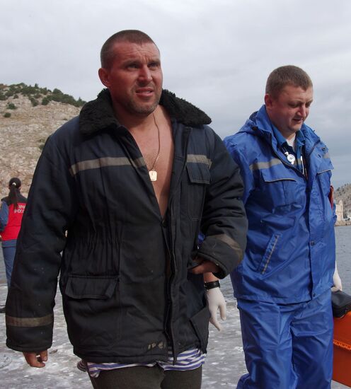 Meeting the sailors of the sunken crane boat