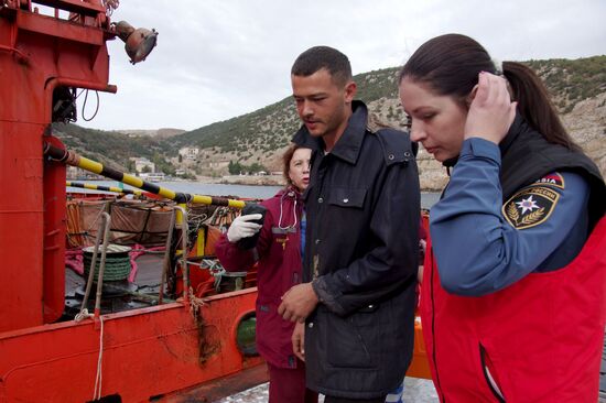 Meeting the sailors of the sunken crane boat