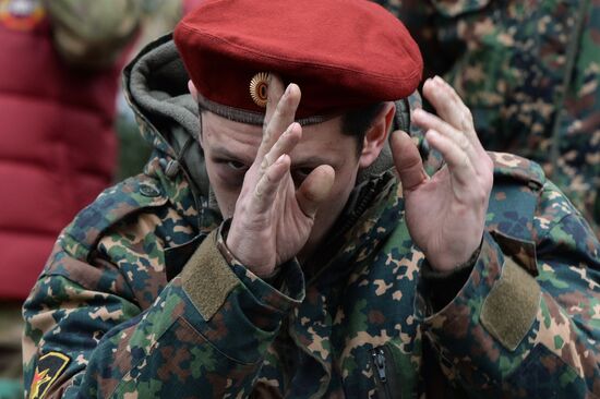 Test for right to wear crimson and green beret by National Guard servicemen