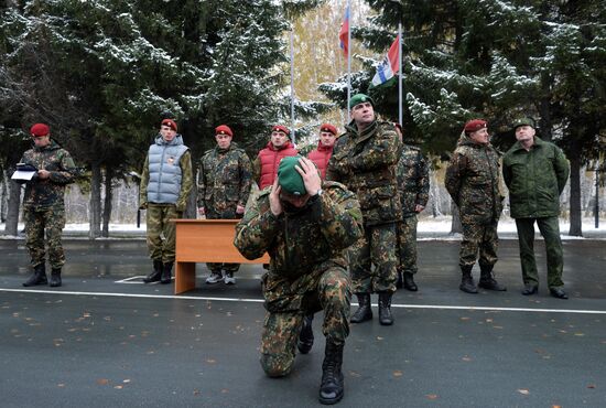 Test for right to wear crimson and green beret by National Guard servicemen