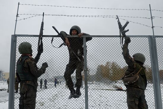 Test for right to wear crimson and green beret by National Guard servicemen