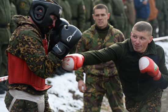 Test for right to wear crimson and green beret by National Guard servicemen