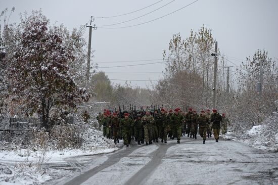 Test for right to wear crimson and green beret by National Guard servicemen