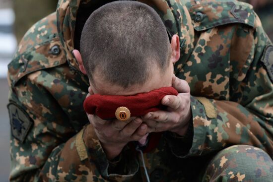 Test for right to wear crimson and green beret by National Guard servicemen