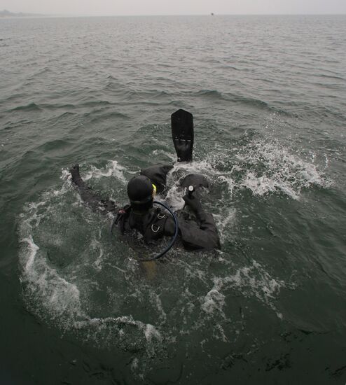 Military swimmers of the Baltic naval base hold training