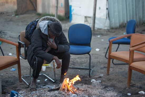 Relocation continues at Jungle spontaneous refugee camp in Calais, France