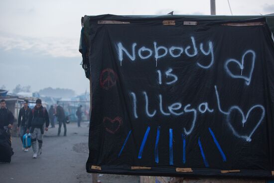 Relocation continues at Jungle spontaneous refugee camp in Calais, France