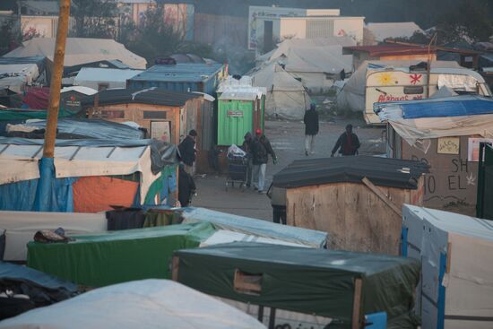 Relocation continues at Jungle spontaneous refugee camp in Calais, France