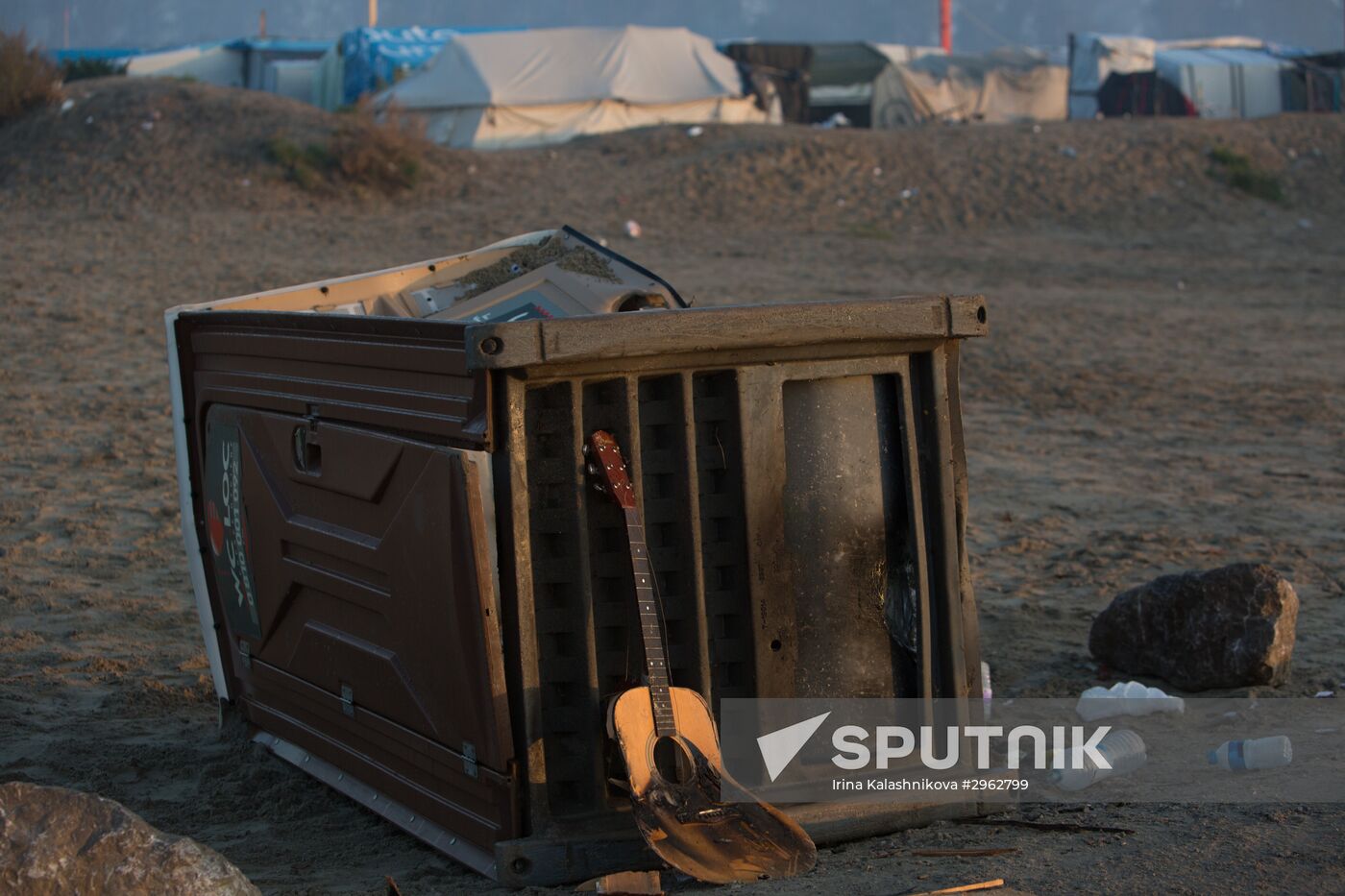 Relocation continues at Jungle spontaneous refugee camp in Calais, France