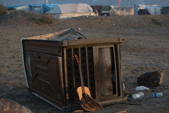 Relocation continues at Jungle spontaneous refugee camp in Calais, France