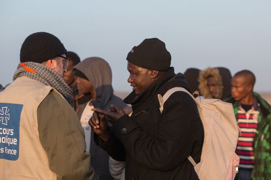 Relocation continues at Jungle spontaneous refugee camp in Calais, France